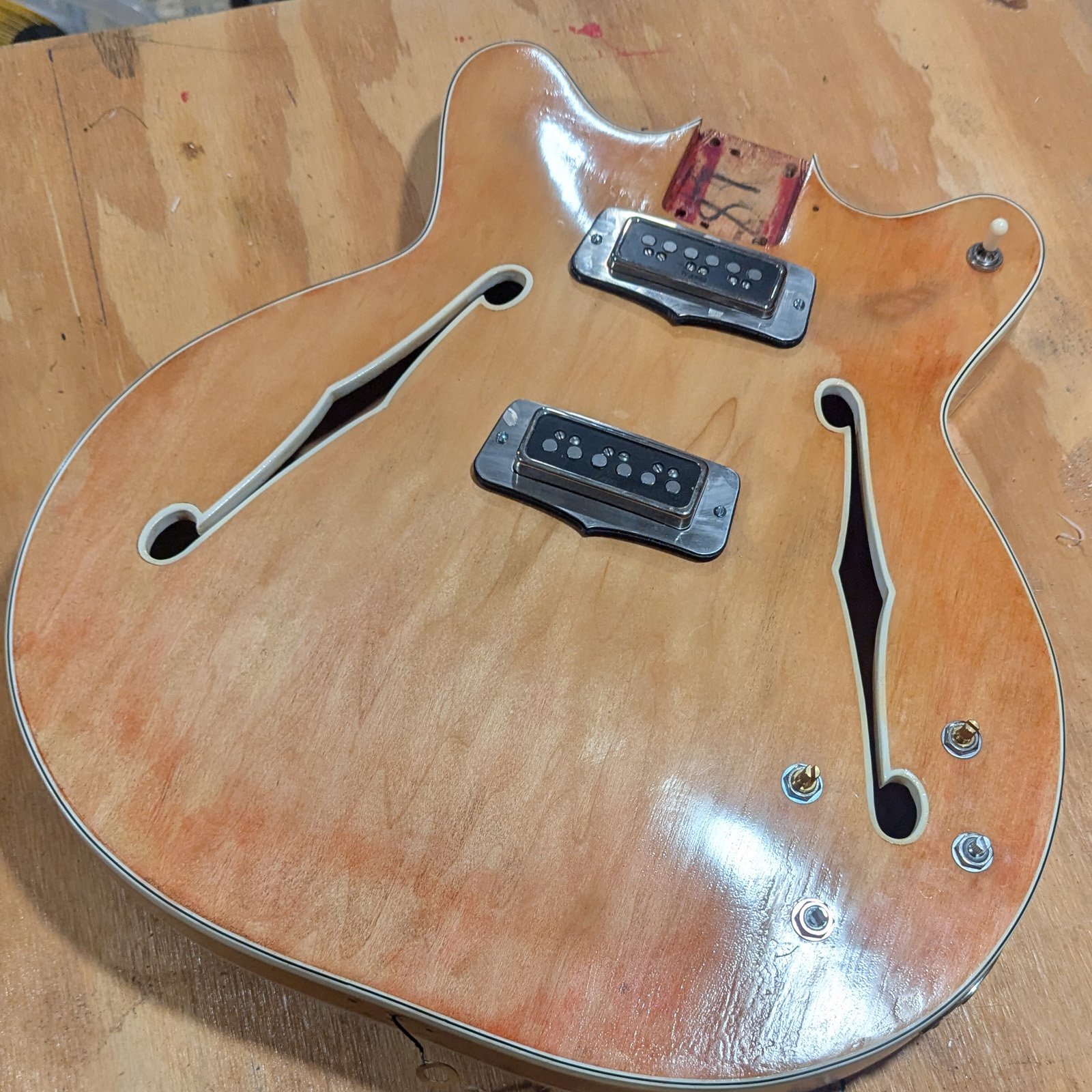 Alternate view of the vintage Fender Coronado II body showing the custom brass and nickel-plated parts.